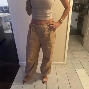 Tan cargo pants with a drawstring waist #cargopants #ballon pants